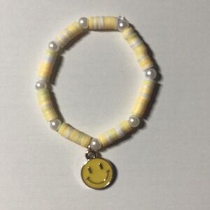 Yellow Beaded Bracelet with Smiley Charm